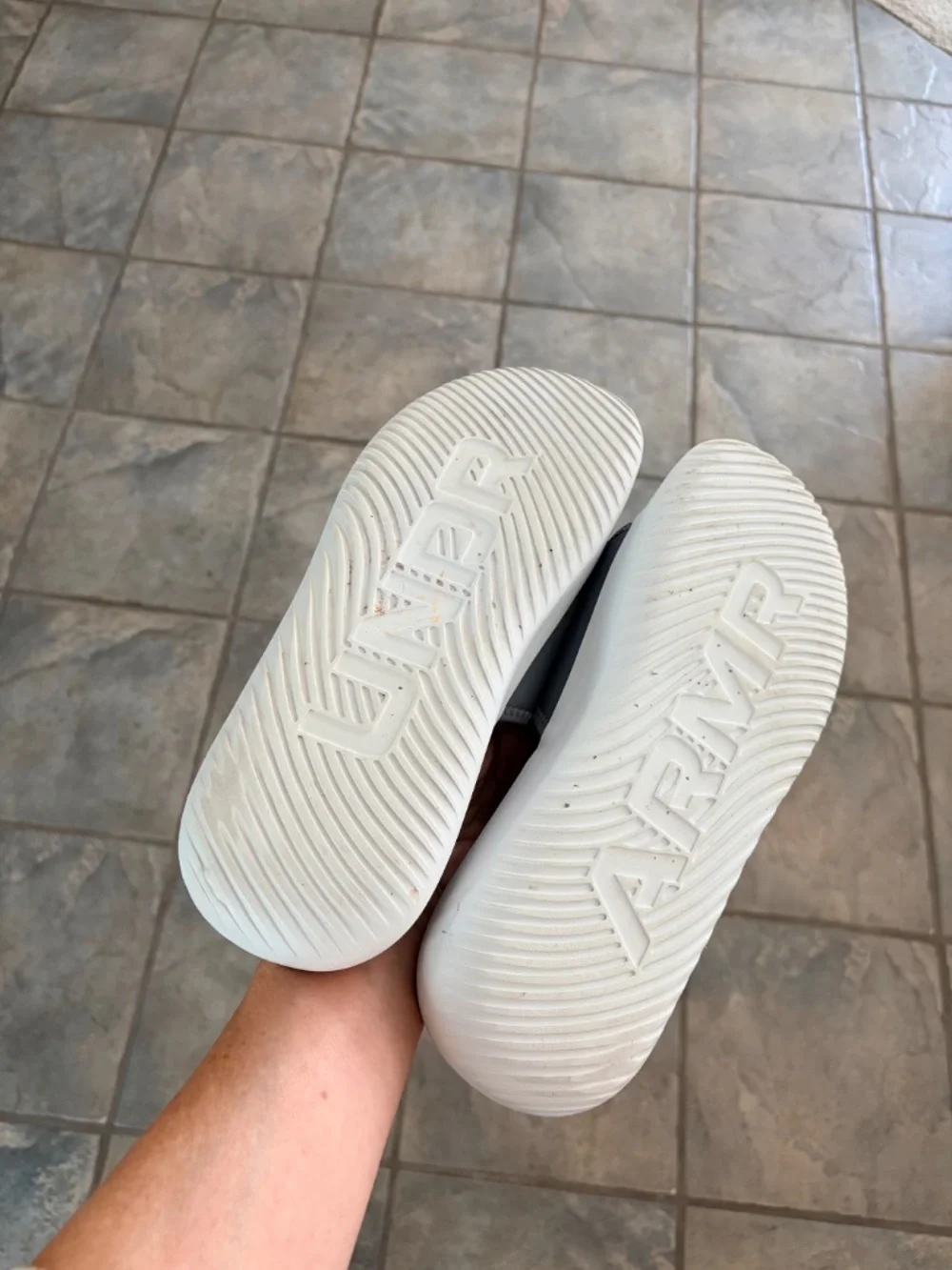 Under Armor Men’s grey, Ignite Pro 8 Slide Sandals.